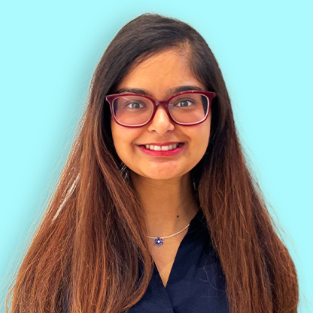 Image of Mohika Gupta in front of blue background